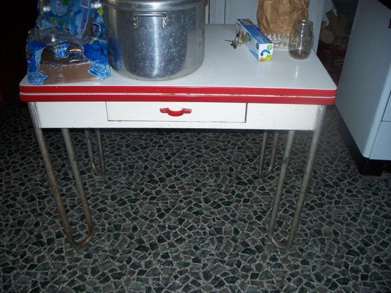 The metal table where many fruits and veggies from the garden were prepared