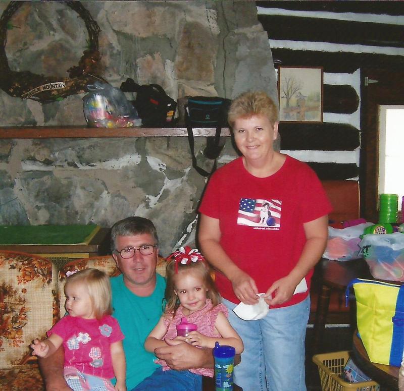 Merle Eugene and Darlene Pruett with grandkids