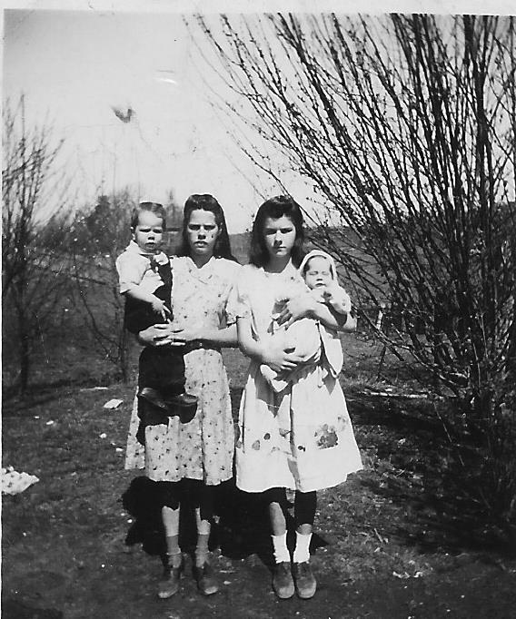 L to R: Uba Faye Pruett holding Roy Earl Pruett/Pruitt, Violet Leola Pruett Hagerman holding James Travis Pruett/Pruitt