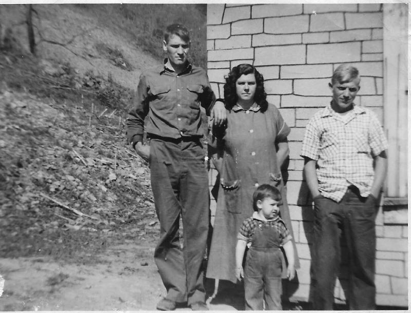 L to R: Ed Hagerman, Violet {Pruett} Hagerman, their son Ellis Hagerman in front, Henry Stacy